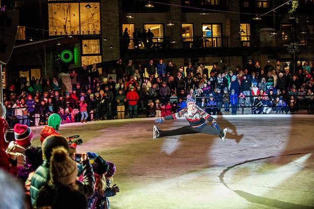Olympic figure skater Paul Wylie performing on the plaza ice rink at the Snowmass Base Village grand opening Saturday night.