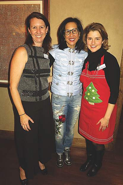 Buddy Program executive director Lindsay Lofaro, advisory board member Mona Look-Mazza, and development director Meghan Pearlman.