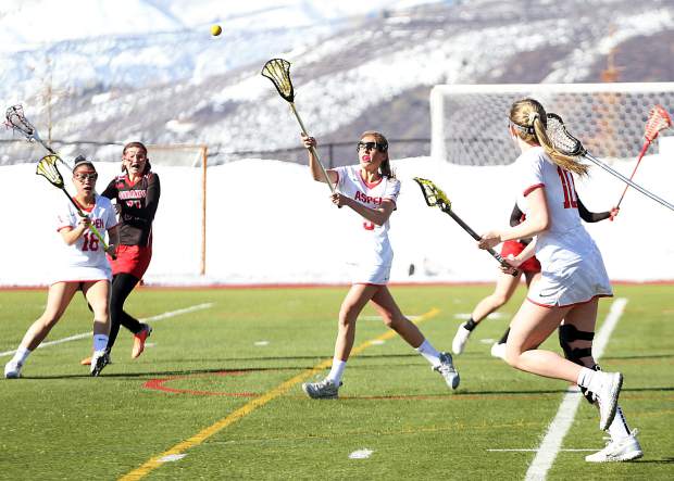 Aspen High School sophomore Kylie Kenny reaches out to haul in a pass during the girls lacrosse against Durango on Tuesday, March 19, 2019, on the AHS turf. (Photo by Austin Colbert/The Aspen Times).