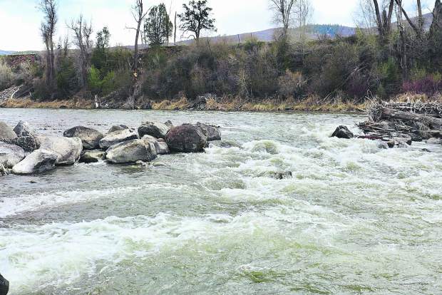 The obvious boat passage in the rocks in the Roaring Fork River in Basalt that make up the Robinson Ditch, after work was done on April 15 to create a better route for rafts and other craft in the diversion structure. It's the cleanest path though the river-wide structure in years.