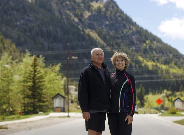 Longtime Colorado BBQ Challenge volunteers Jim and Roxane Fuxa pose for a photo on Main Street on Wednesday, June 12, in Frisco. The festival is possible in part to roughly 400 community volunteers.