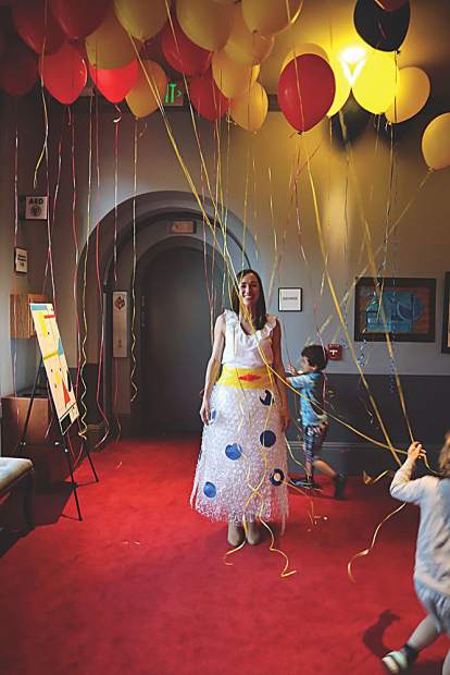 Sarah Roy would look fabulous in anything from a paper bag to (shown here) a skirt made out of bubble wrap.