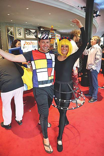 Jeff and Jamie Werner in bright Bauhaus-inspired attire.