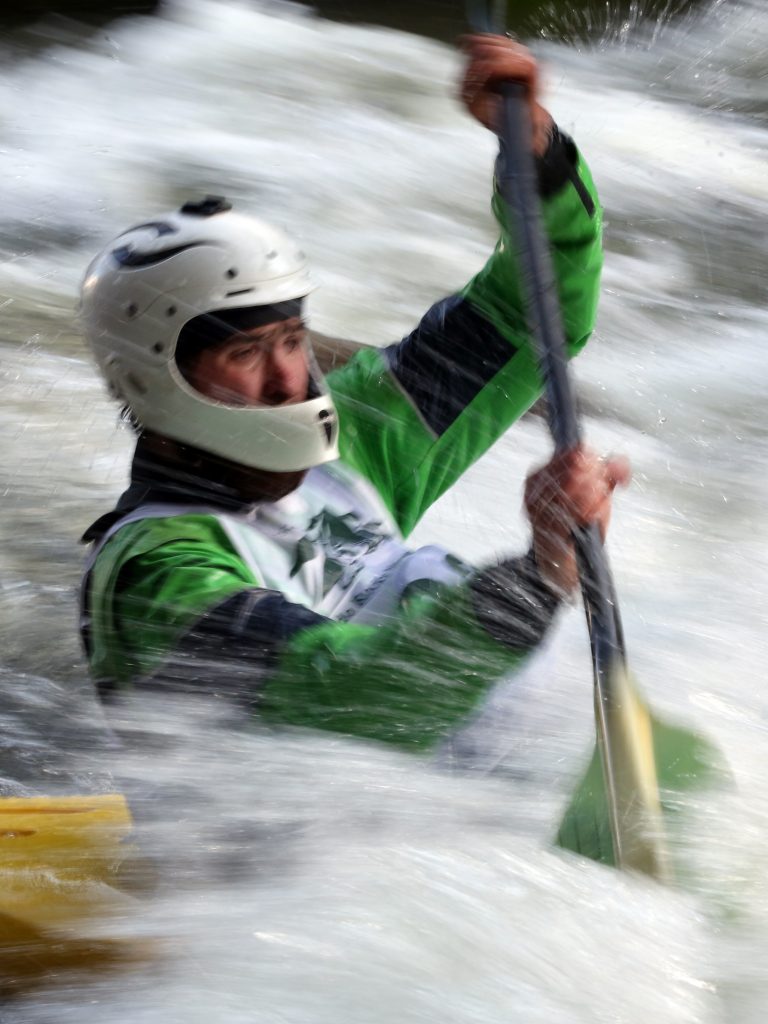 A kayaker goes through some rapids on the Roaring Fork River during the fifth annual Slaughter Fest race on Friday, July 12, 2019. The race, for kayakers, rafters or the daring stand-up paddleboarder, started at Henry Stein Park and finished at Jaffee Park in Woody Creek. (Photo by Austin Colbert/The Aspen Times)