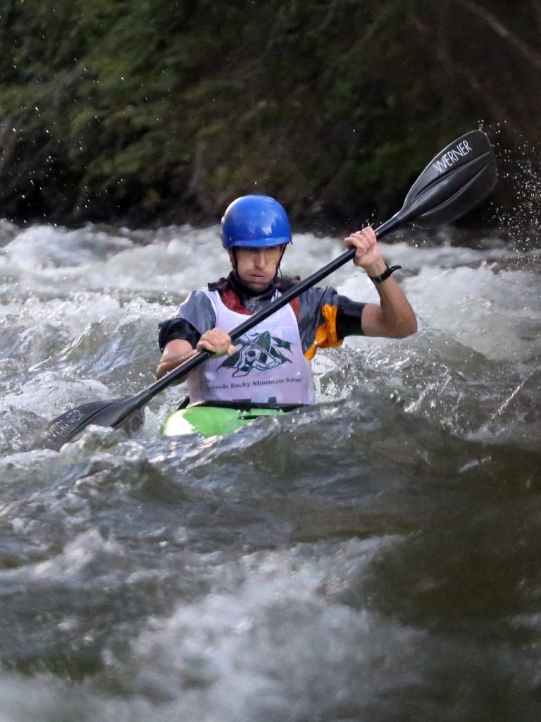 A kayaker goes through some rapids on the Roaring Fork River during the fifth annual Slaughter Fest race on Friday, July 12, 2019. The race, for kayakers, rafters or the daring stand-up paddleboarder, started at Henry Stein Park and finished at Jaffee Park in Woody Creek. (Photo by Austin Colbert/The Aspen Times)