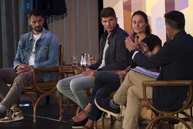 Skier Hilaree Nelson, second from right, talks June 25 during the Aspen Ideas Festival inside the Hotel Jerome Ballroom in Aspen. The panel was moderated by Jon Frankel, right, and included NBA players Kyle Korver and Kevin Love, far left.