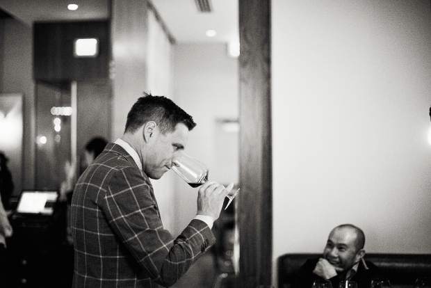 Master Sommelier Bobby Stuckey takes a sniff of wine at his Frasca Food & Wine on Boulder's Pearl Street.