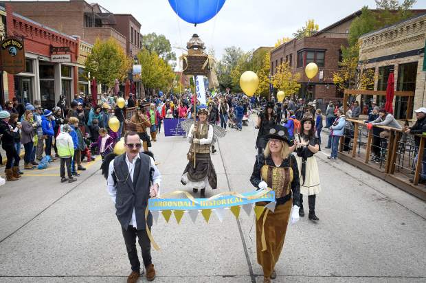 Members of the Carbondale Historical Society make their way through downtown during the traditional parade kicking off Potato Day last year.