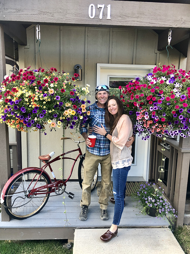 Brett Beavers and Kathy Fry surrounded by their blooms this summer.