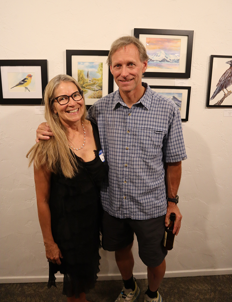 Artist Amy Beidleman with her husband, Neal, at an Aspen Chapel art show benefiting ACES.