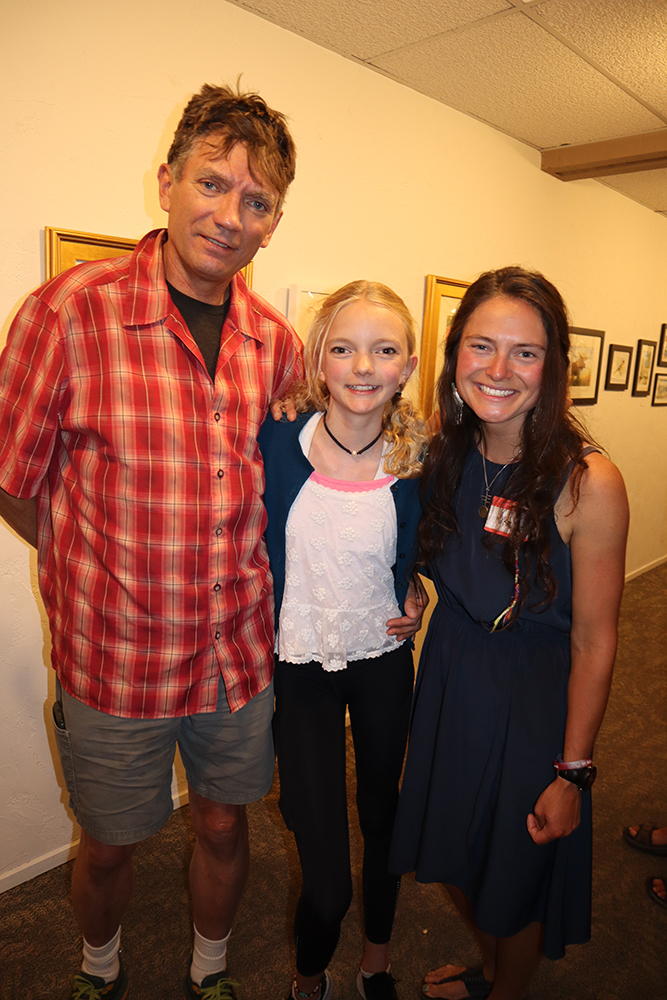 John and Sylvan Doyle with artist Nika Meyers at the Aspen Chapel.