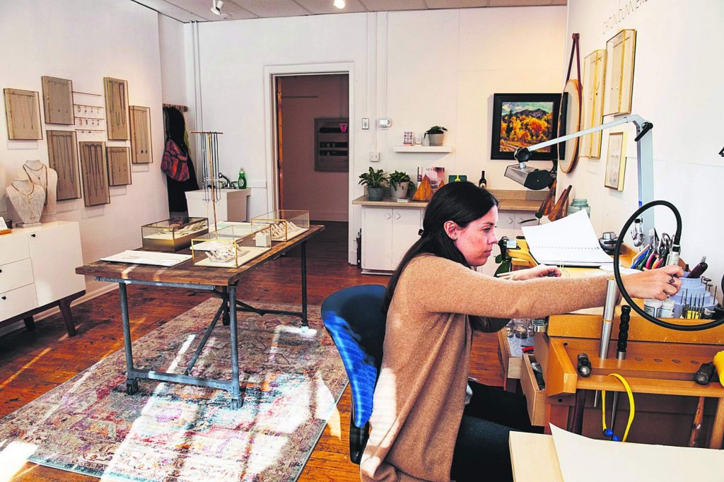 Jewelry artist Caitlin Dunn works on pieces in her studio at the Red Brick Center for the Arts in Aspen on Thursday, November 14, 2019. (Kelsey Brunner/The Aspen Times)