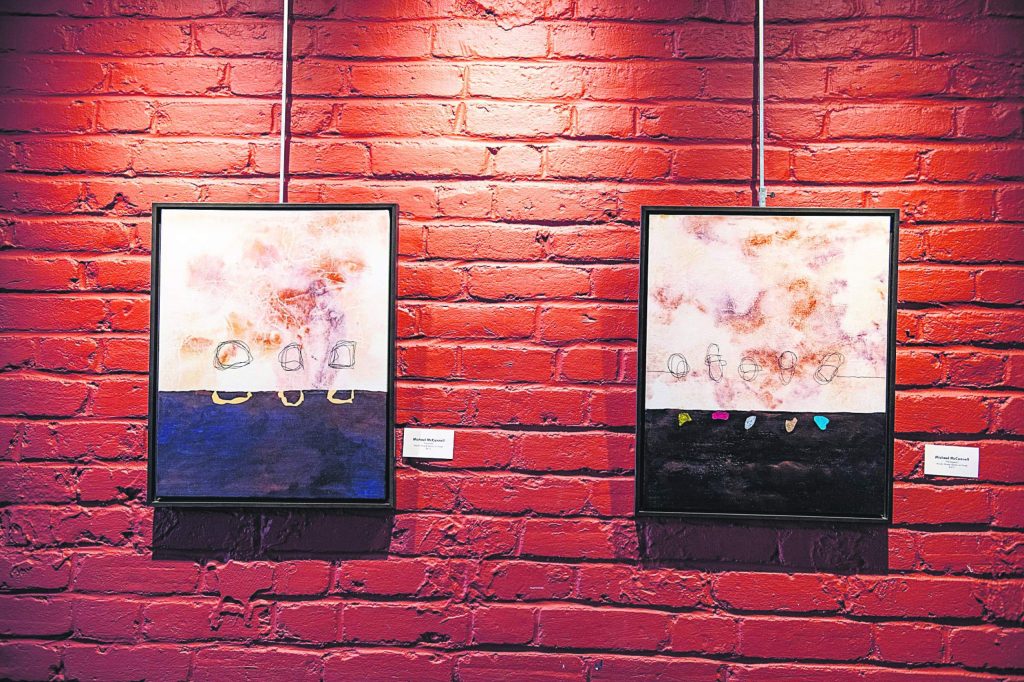 Paintings by Michael McConnell hang at the Red Brick Center for the Arts for the Resident Artists Exhibition in Aspen on Thursday, November 14, 2019. (Kelsey Brunner/The Aspen Times)
