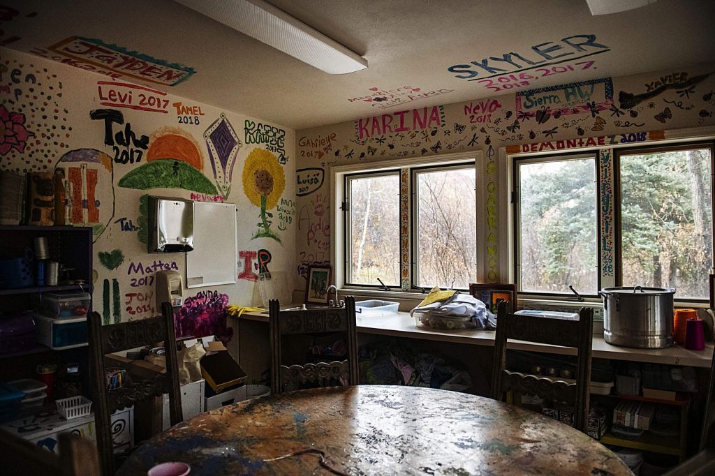 Names and dates decorate the walls of one of the craft rooms at the Aspen Camp of the Deaf and Hard of Hearing on Thursday, Nov. 21, 2019. (Kelsey Brunner/The Aspen Times)