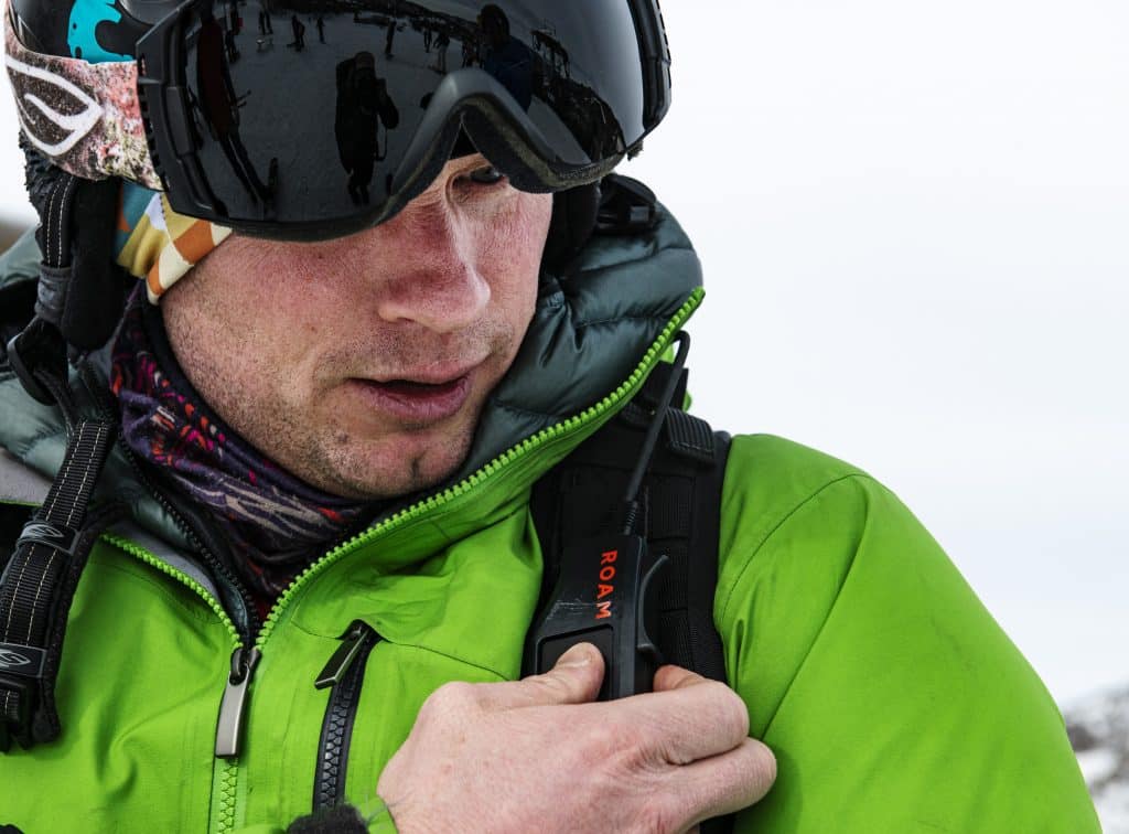 Jim Harris adjusts his ROAM Robotics Elevate exoskeleton using the battery backpack before starting his day of skiing on Snowmass on Friday, Jan. 31, 2020. (Kelsey Brunner/The Aspen Times)