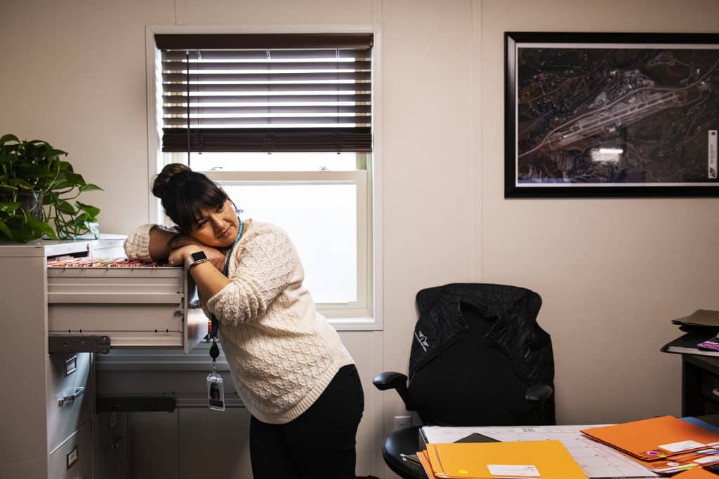 Aspen/Pitkin County Airport’s credentialing and badging specialist Anais Hernandez works in her office on Thursday, April 2, 2020. 