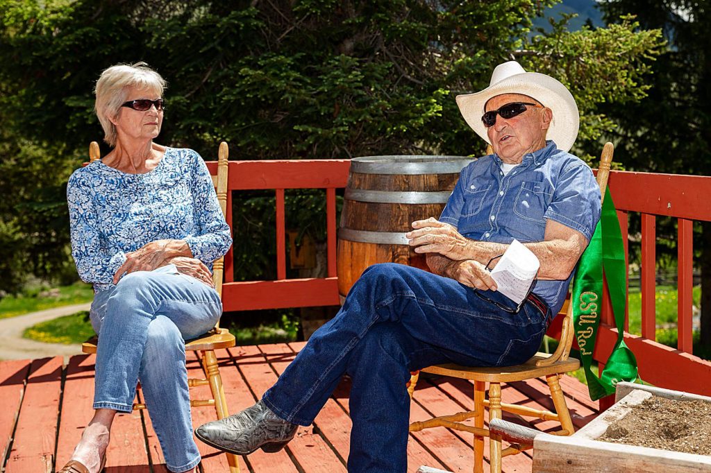 Susy and George Culbreath sit on the porch of their ranch in Heeney and engage in conversation on Saturday, May 30. George is a recent inductee into the Rodeo Hall of Fame.