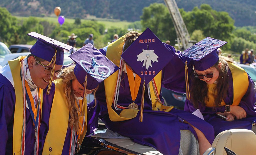Basalt High School Class of 2020 graduates pose for a photo of the tops of their caps on May 30, 2020. (Maddie Vincent/The Aspen Times)