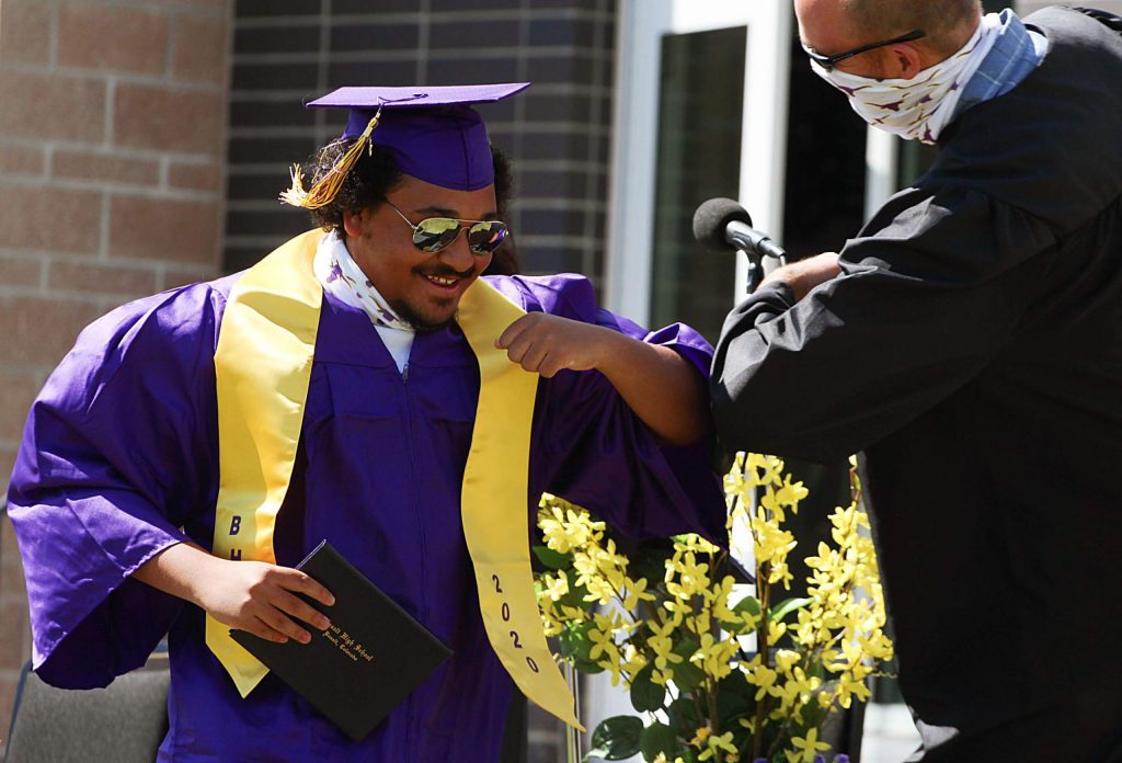 Seniors bump elbows with Basalt High School teachers on May 30, 2020. (Maddie Vincent/The Aspen Times).