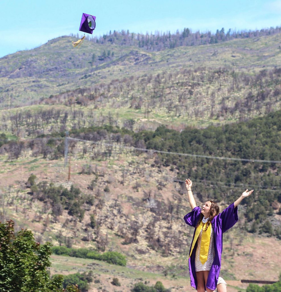 A Basalt senior throws up her cap after the Class of 2020 graduation ceremony on May 30, 2020. (Maddie Vincent/The Aspen Times).