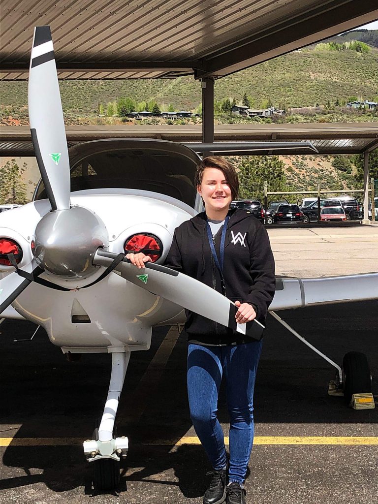 Hannah Popish, 16, smiles for a photo after going on her first solo flight this past school year.