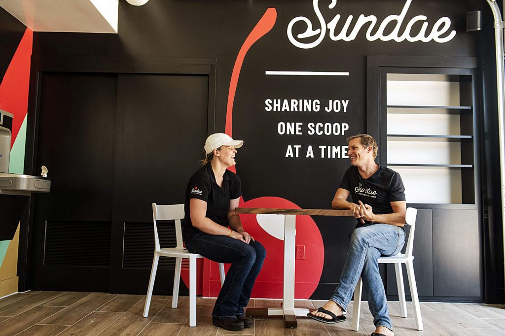 Sundae general manager Ashlyn Streetz, left, and owner Kent Beidel share a conversation in the artisan ice cream shop in Snowmass Base Village on Thursday, July 30, 2020. 