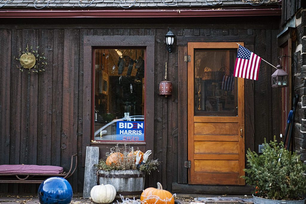 A Biden/Harris sign sits in the window of a home in Aspen still decorated for Halloween on Election Day, Tuesday, Nov. 3, 2020. (Kelsey Brunner/The Aspen Times)