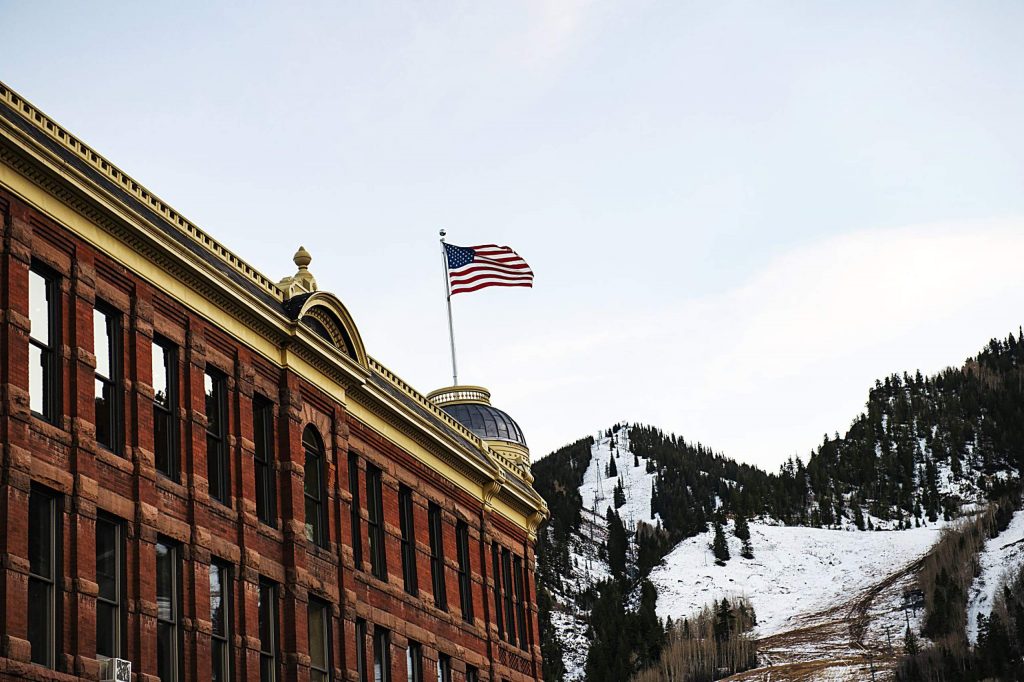 An American Flag waves in the wind from the top of the Elks Building in Aspen on Election Day, Tuesday, Nov. 3, 2020. (Kelsey Brunner/The Aspen Times)