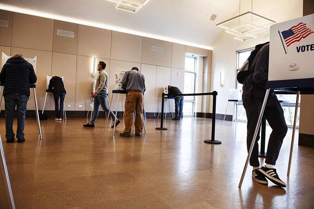 Voters fill out their ballots at socially distanced voting booths in the Aspen Jewish Community Center on Election Day, Tuesday, Nov. 3, 2020. (Kelsey Brunner/The Aspen Times)