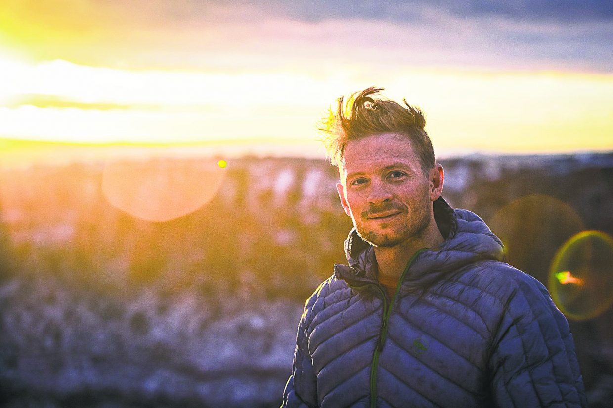 Jim Harris greets the sunrise after fulfilling a post injury goal of camping near Moab on his birthday.
