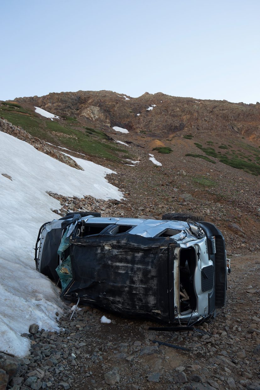 This Toyota FJ Cruiser, driven by Denver resident James Scully, came to rest on its side after Scully rolled it at least 6 times down a steep mountainside near Montezuma Basin, toward the trailhead to Castle Peak and Conundrum Peak. Read about the harrowing incident on page A3.