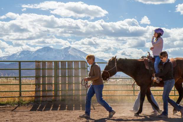 Gwen Carew was diagnosed with a form of autism and uses the therapy sessions at WindWalkers for socializing with people and animals, as well as a form of therapy to help calm her mind.