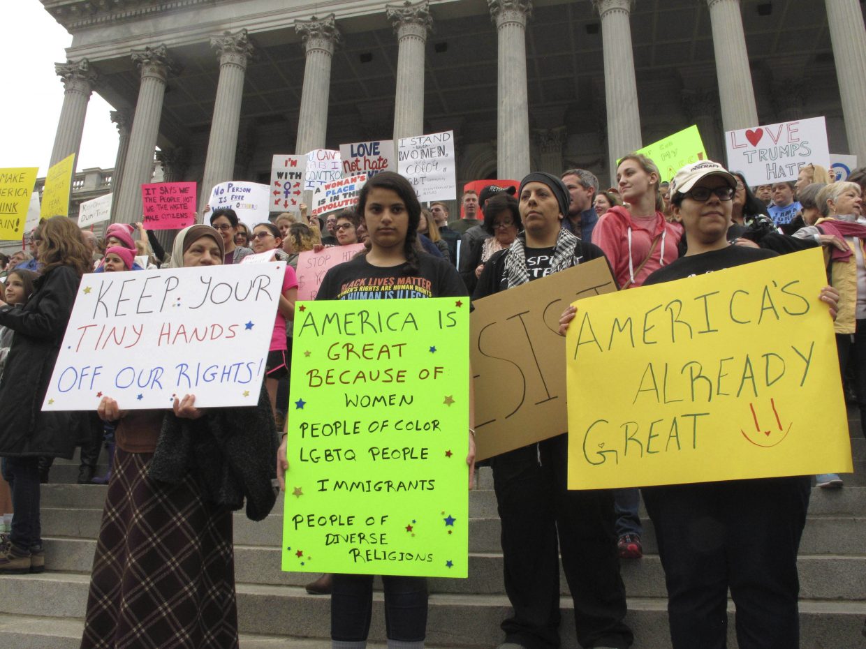Thousands of women gather for the Stand Up Rally for women and minority rights on Saturday, Jan. 21, 2017, at the Statehouse in Columbia, S.C. 