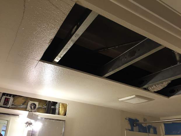Residents moved back into Manor II with holes in the drywall of their apartments exposing wire, piping and the sprinkler system.