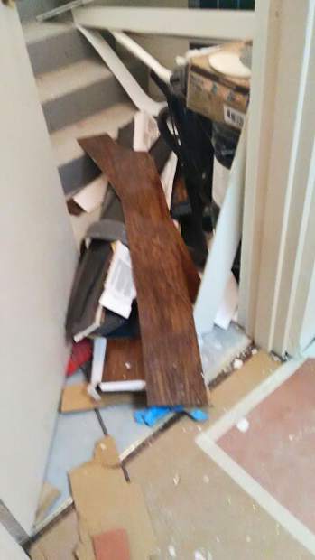 Residents of Manor I say they moved back in to find debris from the remodeling work blocking stair wells and strewn through the hallways.