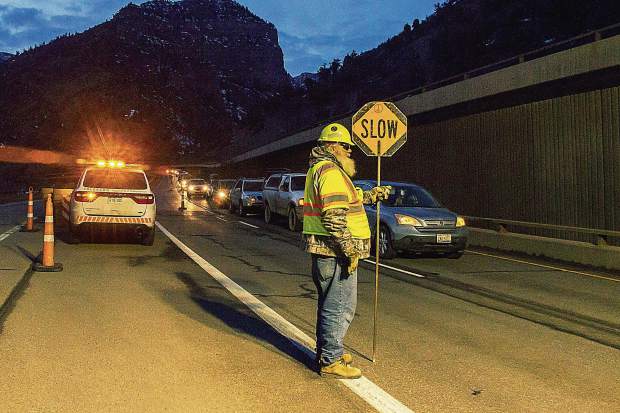 The first line of cars to travel through Glenwood Canyon lines up after a weeklong closure in February.