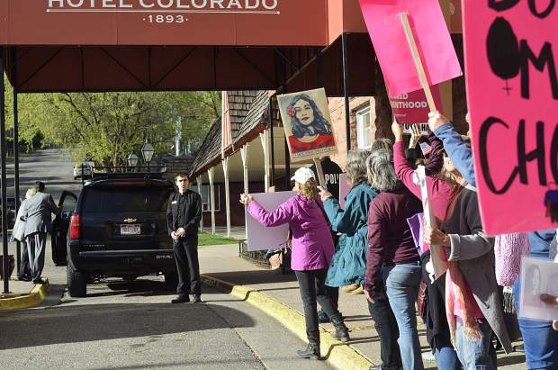 Protesters kept an eye out for Sen. Cory Gardner entering the Hotel Colorado. But however the senator got inside for his fundraiser, he seemed to have slipped through undetected.