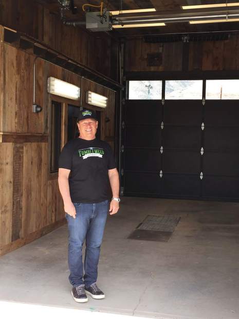 CEO Mark Smith stands outside what will be the drive-thru marijuana dispensary in the state.