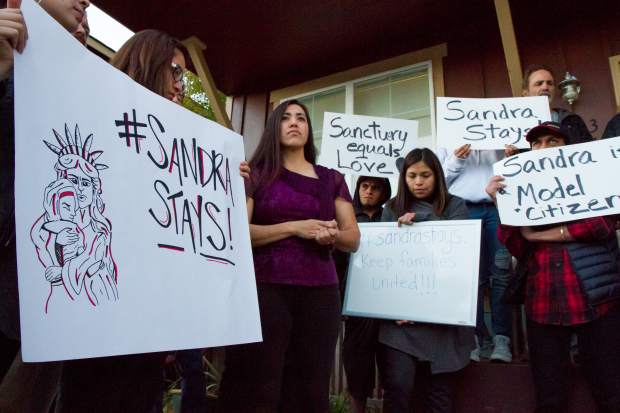 Sandra Lopez addresses the crowd during the press conference in Carbondale on Tuesday evening.
