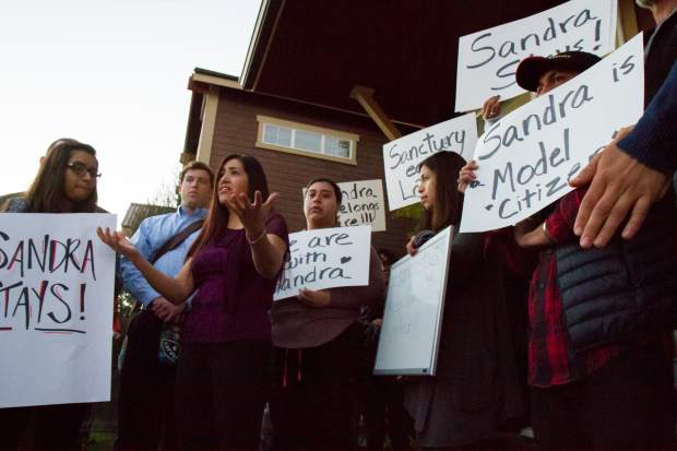 Sandra Lopez addresses the crowd during the press conference in Carbondale on Tuesday evening.