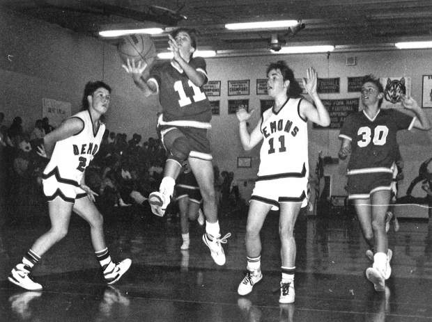 Tricia Bader takes it to the hoop against the Glenwood Springs Demons during her high school playing days.