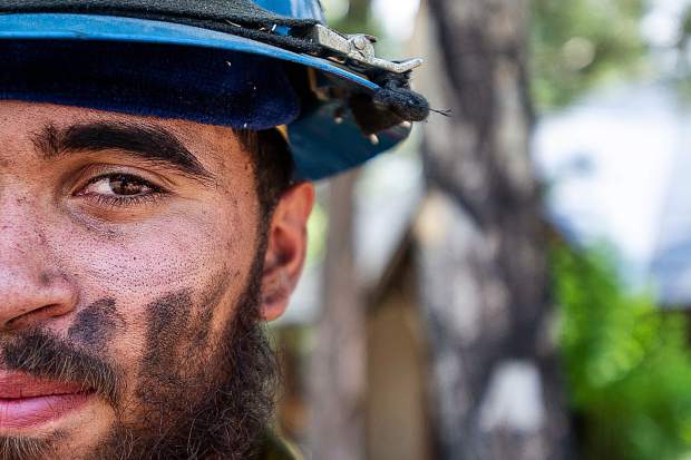 Oregon firefighter Markus Idroga after working the line on the Lake Christine Fire on Sunday afternoon.