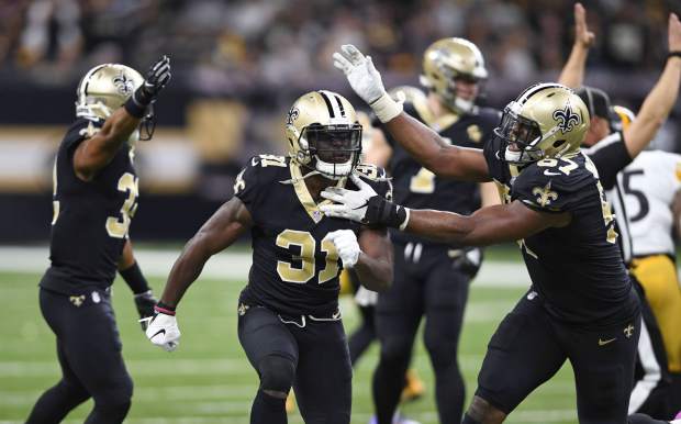 New Orleans Saints defensive back Chris Banjo (31) celebrates a defensive stop in the second half of an NFL football game against the Pittsburgh Steelers in New Orleans, Sunday, Dec. 23, 2018. (AP Photo/Bill Feig)