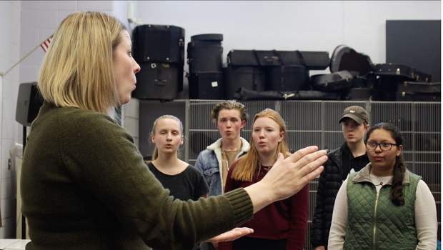 Roaring Fork High School and Carbondale Middle School choir and drama teacher Marcia Kuhlman leads chamber choir rehearsal at RFHS last week.