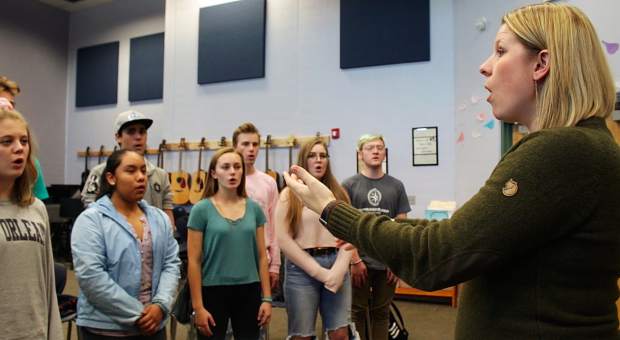 Roaring Fork High School and Carbondale Middle School choir and drama teacher Marcia Kuhlman leads chamber choir rehearsal at RFHS last week.