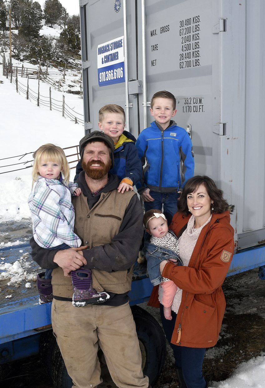 Thad Porter, owner of Hogback Storage, personally delivers his storage containers to customers, oftentimes with his whole family in tow.