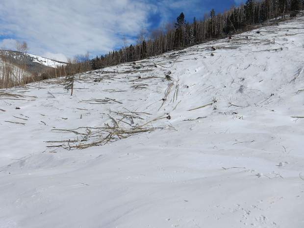 The force of the avalanche carried snow up the opposite or east side of Conundrum Valley. It will had enough power to snap off several trees.