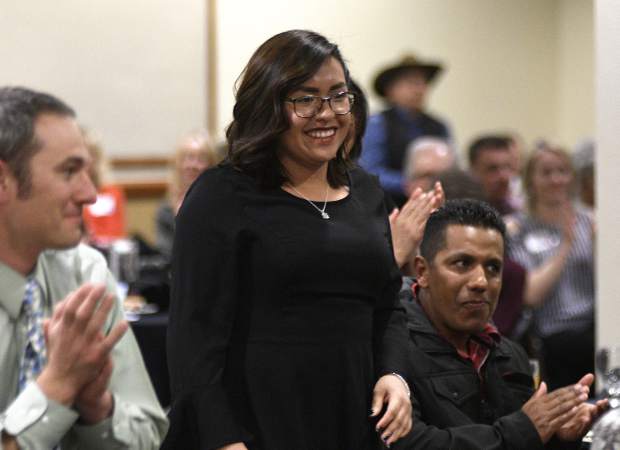 Briana Rodriguez Cruz is all smiles after Garfield County Commissioner Mike Samson announced her as one of the three recipients of the 2019 Humanitarian Service Awards Monday in Rifle.