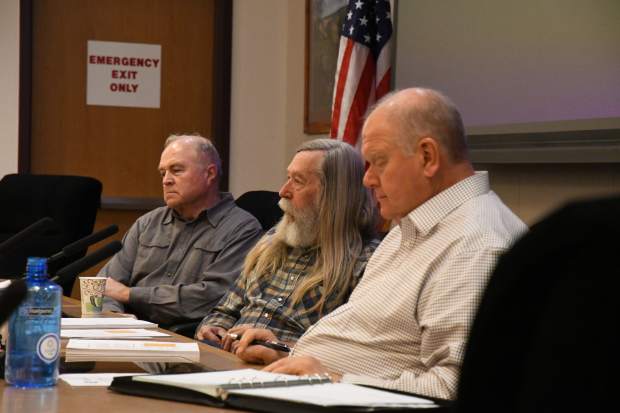 Garfield County commissioners listen as Representatives David Schwartz and Chris Cares give a presentation on housing needs in the Roaring Fork Valely region on Tuesday morning.