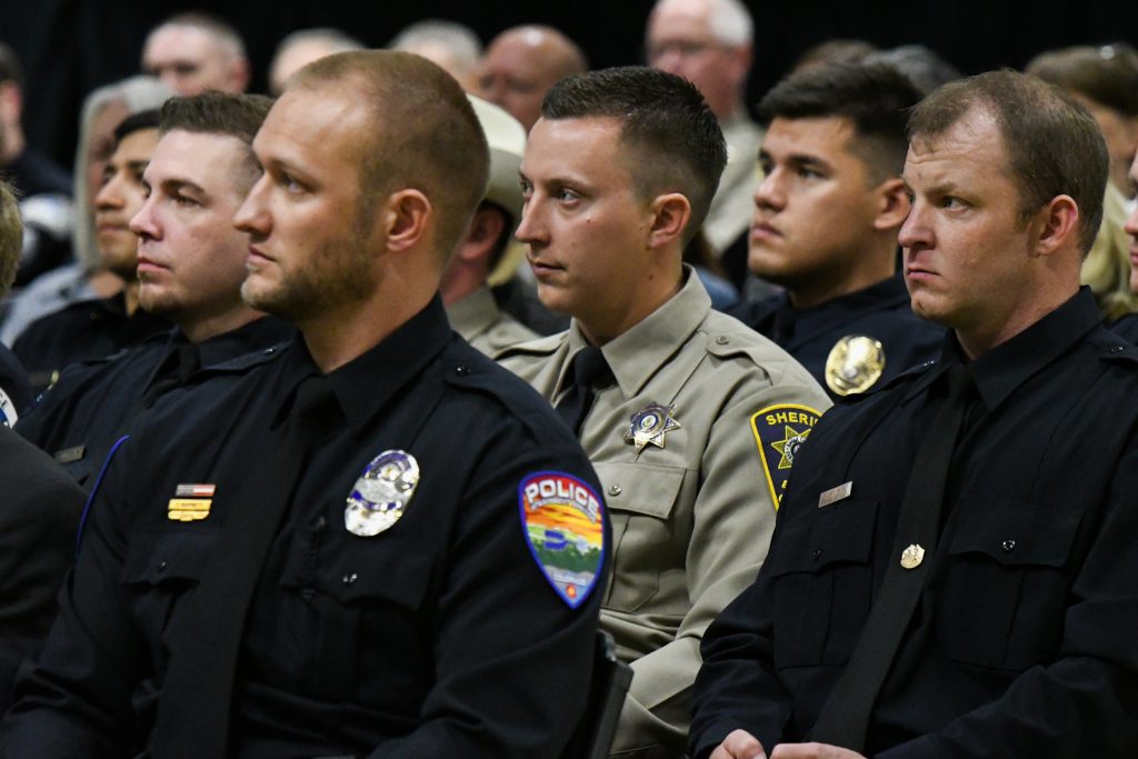 Colorado Mountain College CLETA graduates sit and listen to commencement speaker Castle Rock Chief Jack Cauley during the ceremony on Thursday afternoon.